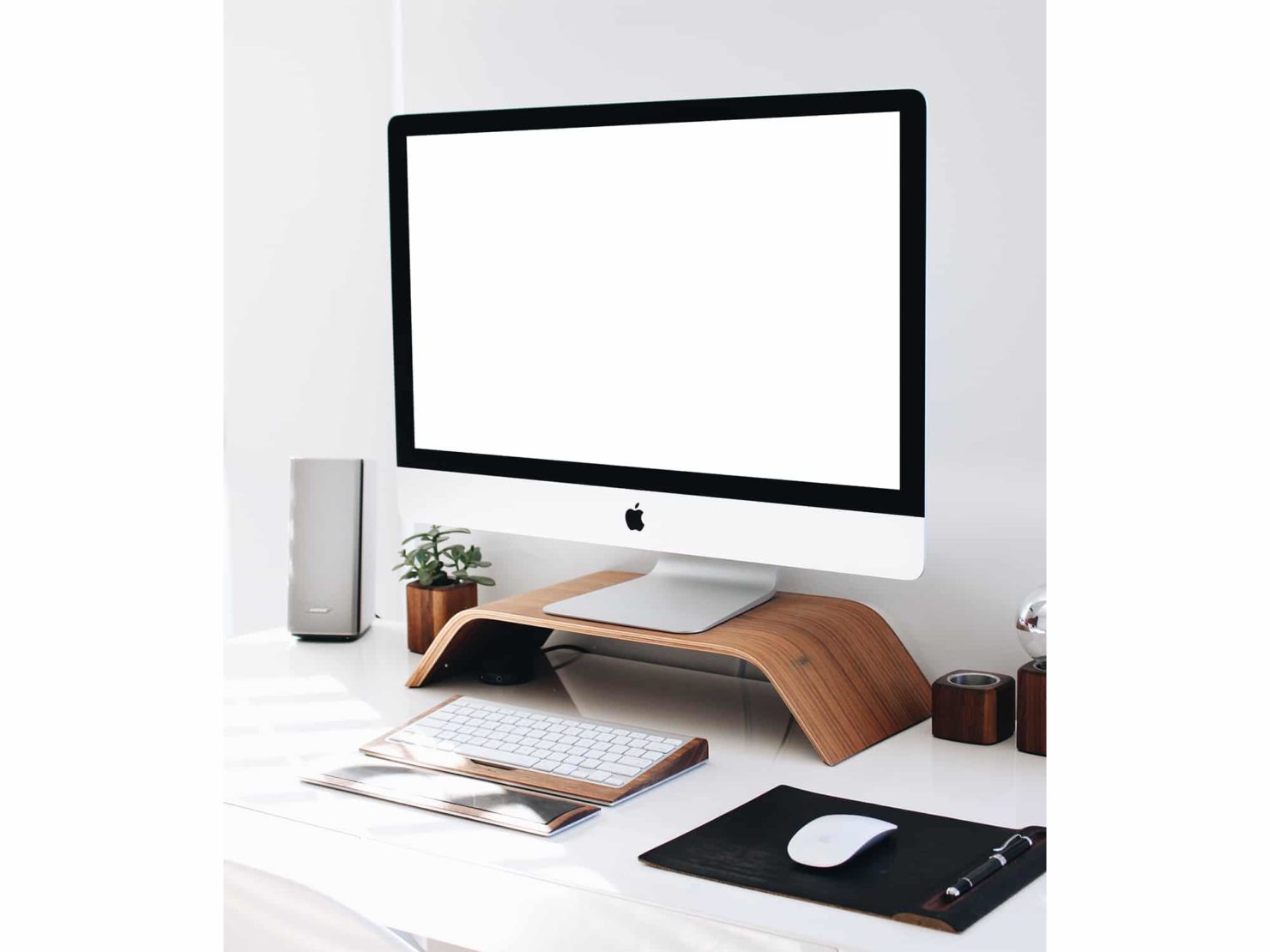 Download iMac on Wooden Monitor Stand Mockup | The Mockup Club